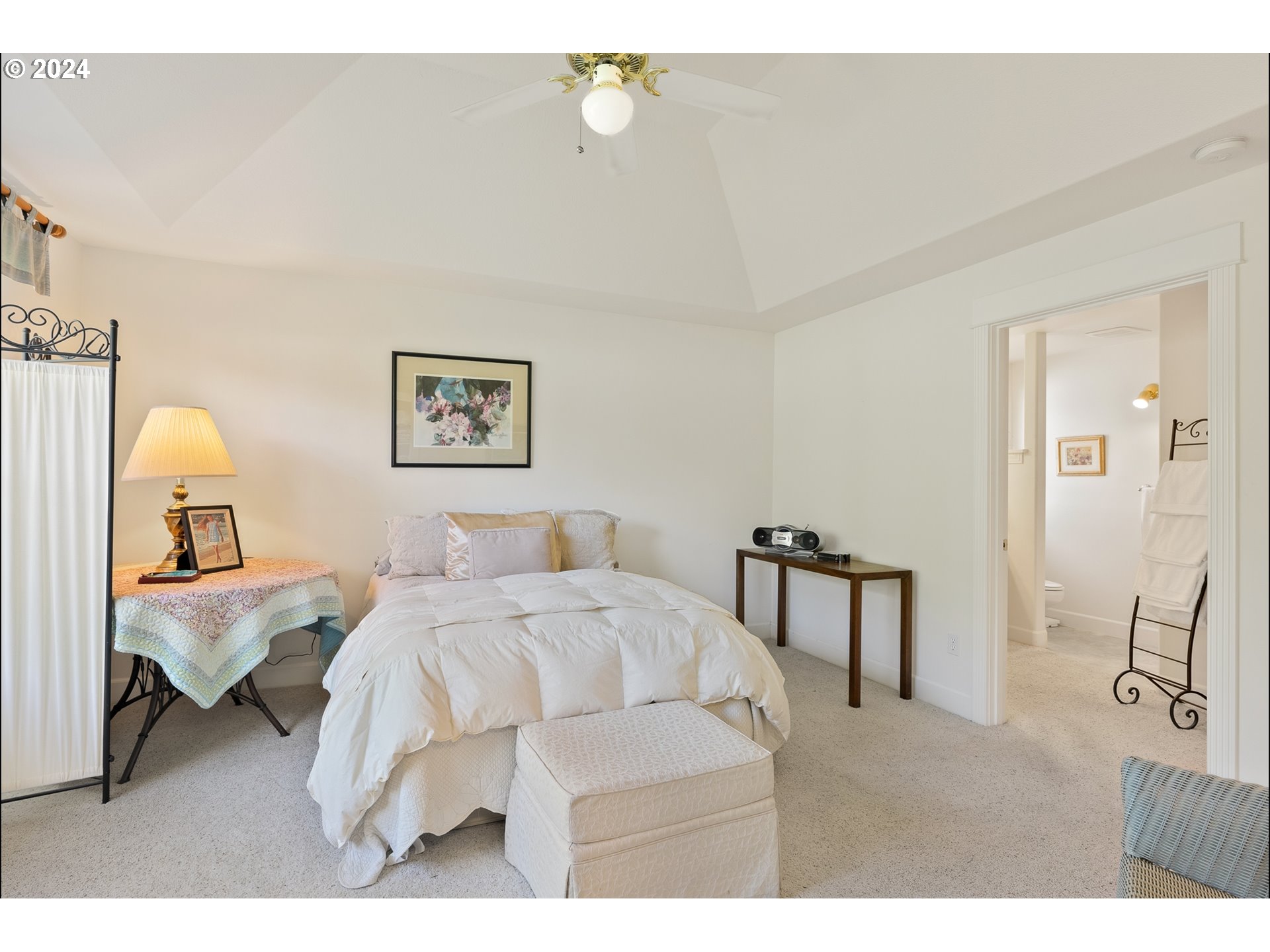 3 Waterford Downs Florence, OR 97439 - Photo 40 of 46 a bedroom with a bed window and chair