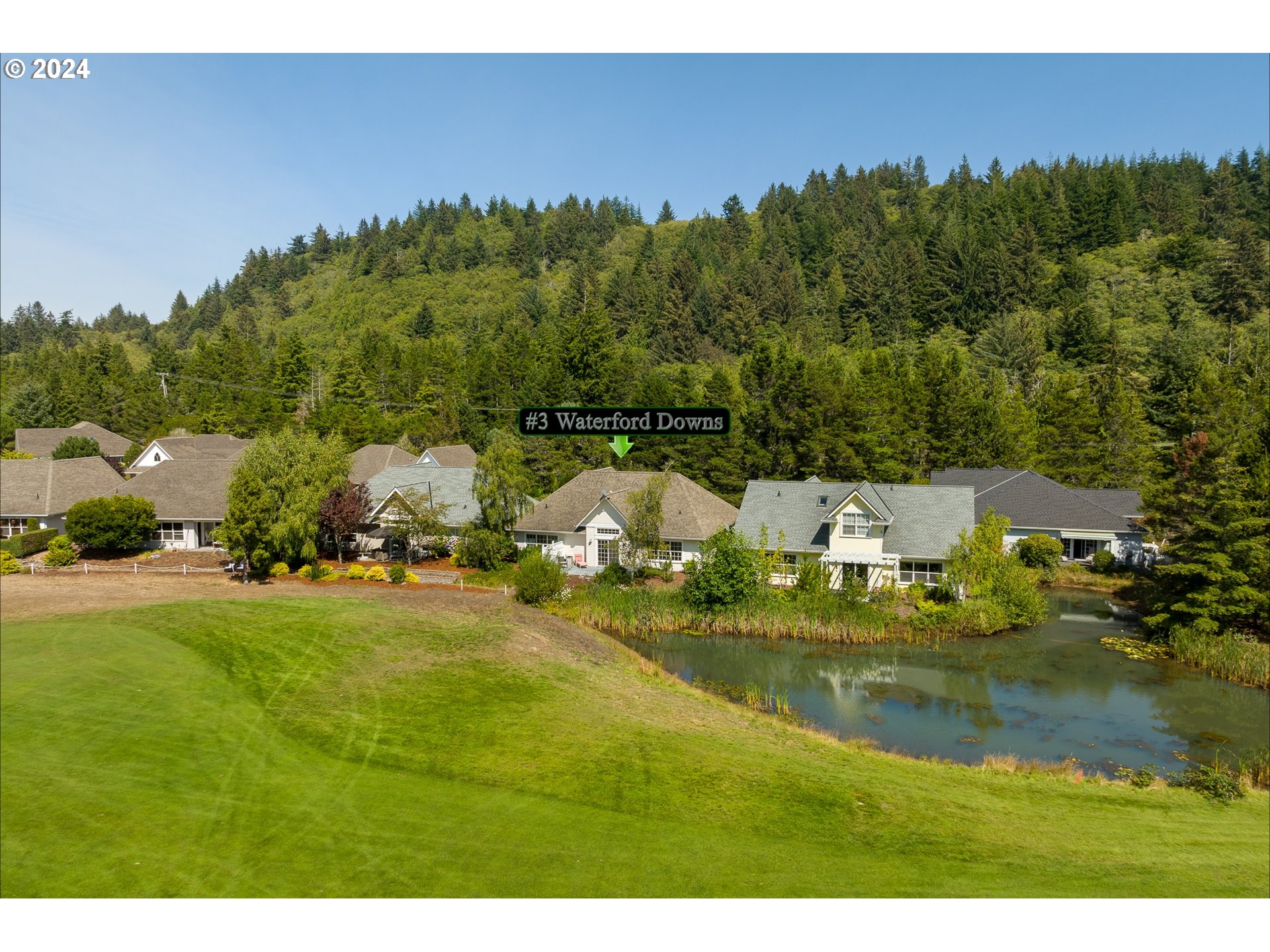 3 Waterford Downs Florence, OR 97439 - Photo 4 of 46 a view of a lake with houses
