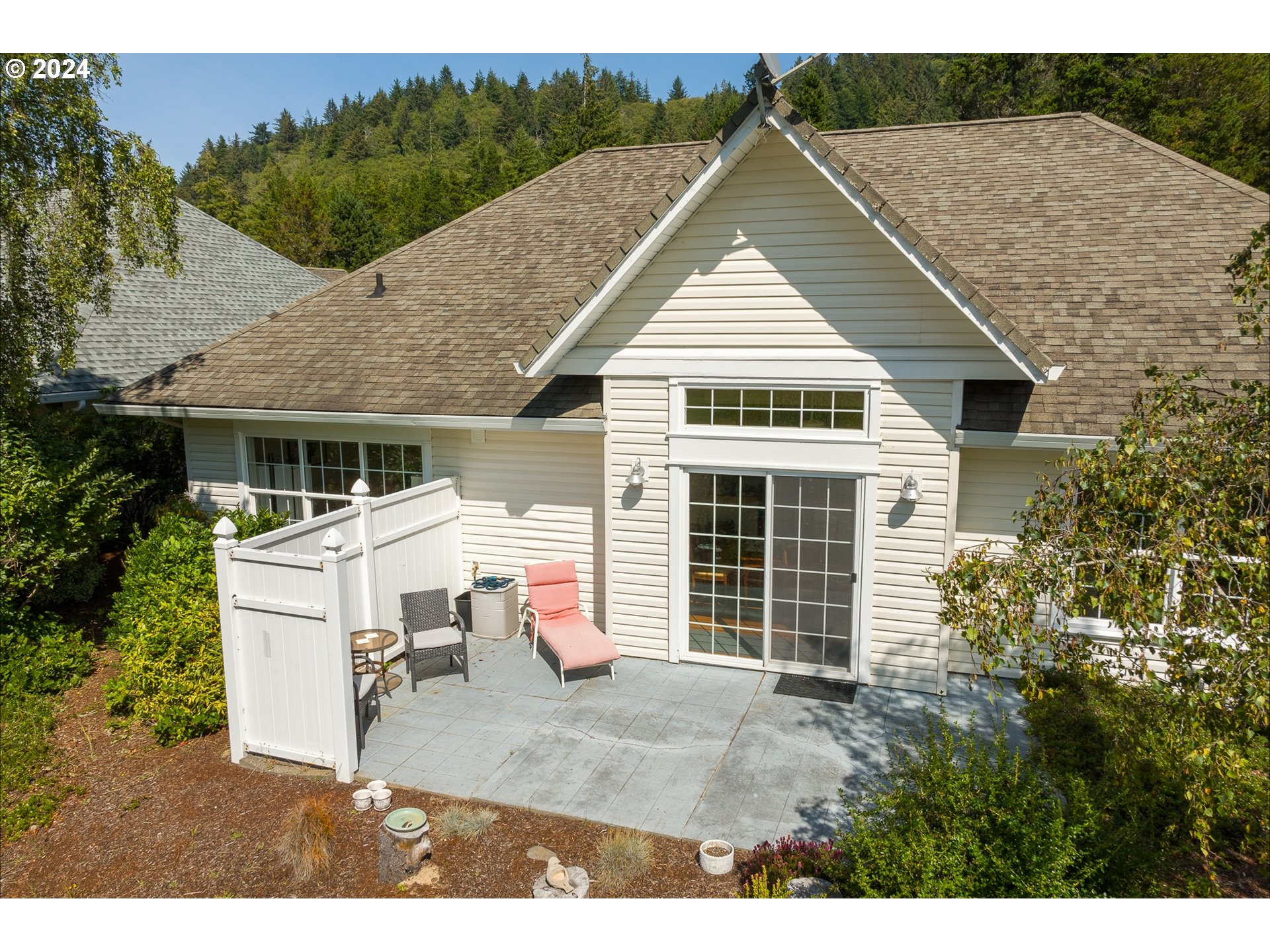 3 Waterford Downs Florence, OR 97439 - Photo 43 of 46 a view of a house with a yard