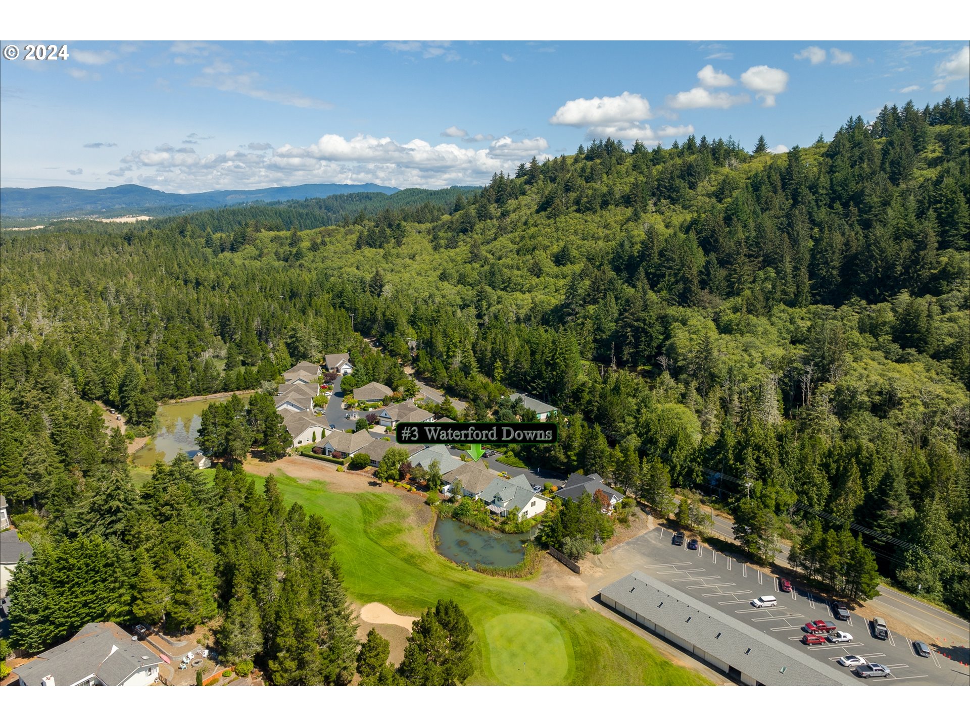 3 Waterford Downs Florence, OR 97439 - Photo 7 of 46 a view of a lake with a city