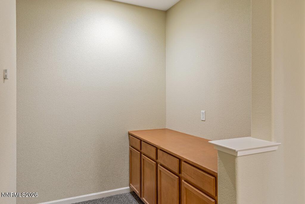 1864 Wind Ranch Road, Unit B Reno, NV 89521 - Photo 31 of 42 a utility room with dryer and washer