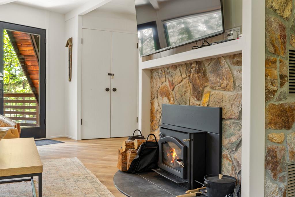 501 Gamble Road McCall, ID 83638 - Photo 5 of 28 Wood-burning fireplace, Adding atmosphere to the living area and keeping the chill away on a cool morning.