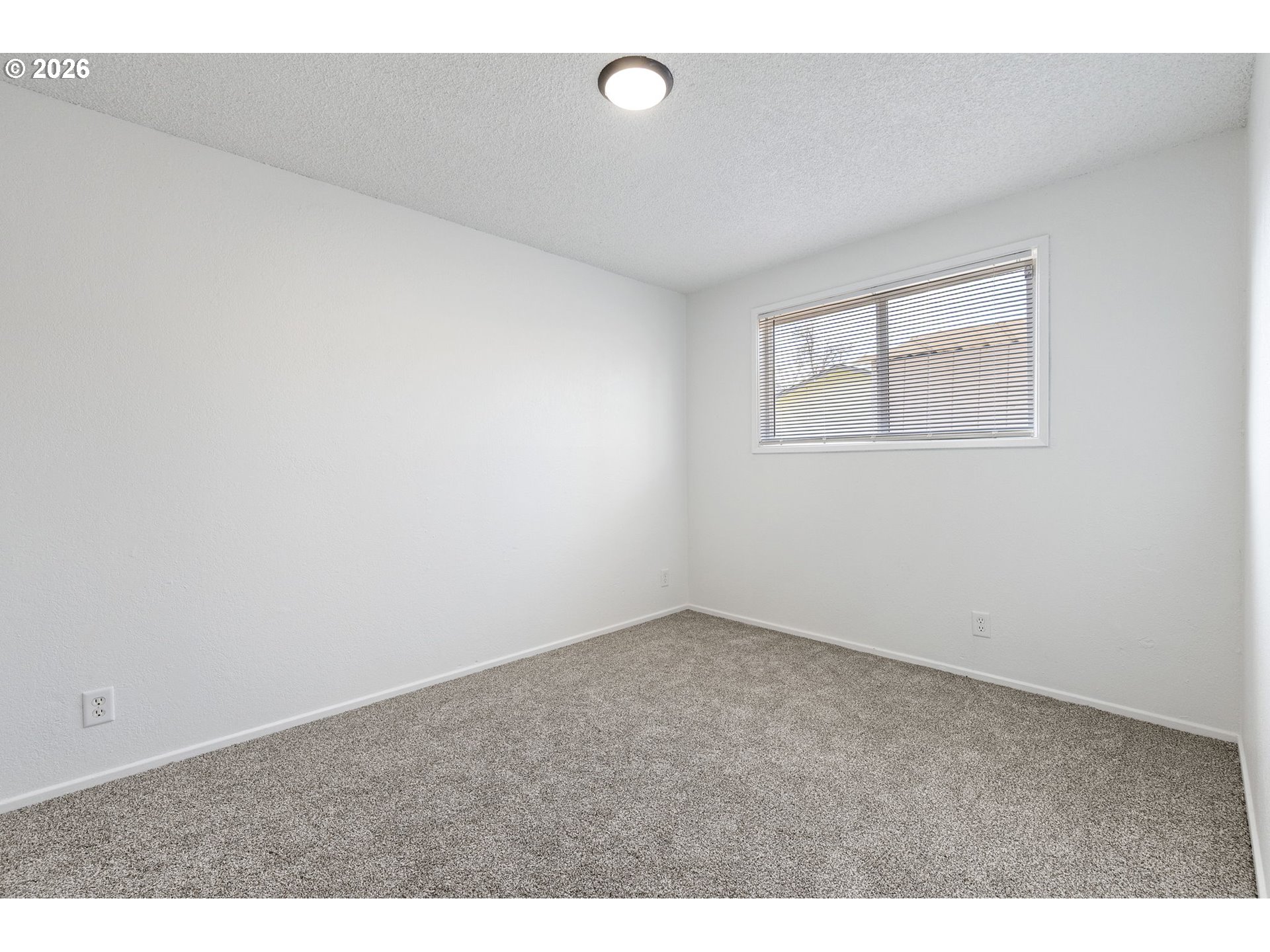 422 South 49th Place Springfield, OR 97478 - Photo 17 of 32 an empty room with windows
