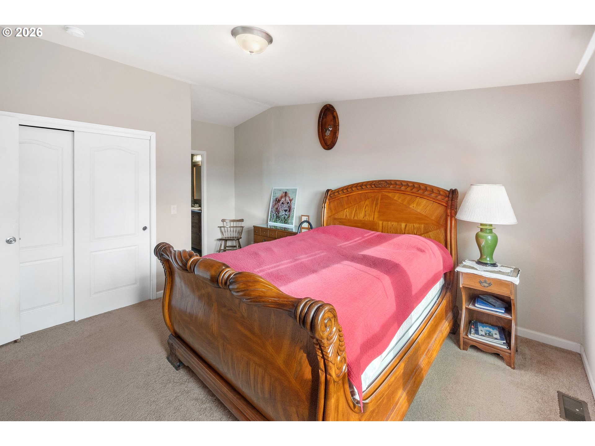 95300 Grassy Knob Road Port Orford, OR 97465 - Photo 11 of 25 a bedroom with a bed and a chandelier
