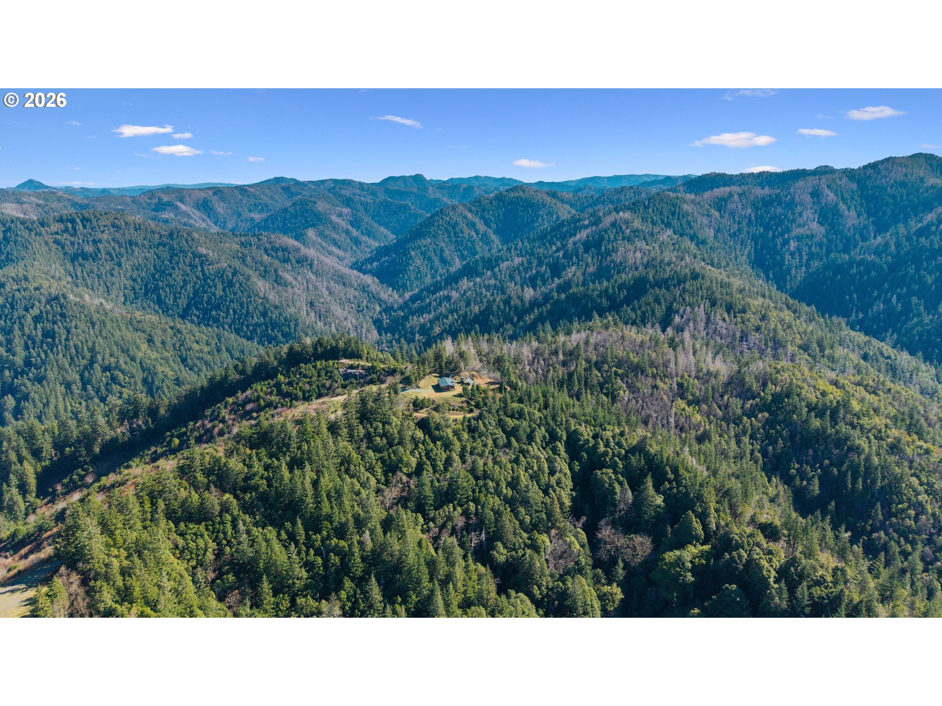 95300 Grassy Knob Road Port Orford, OR 97465 - Photo 19 of 25 a open area with mountains in the background