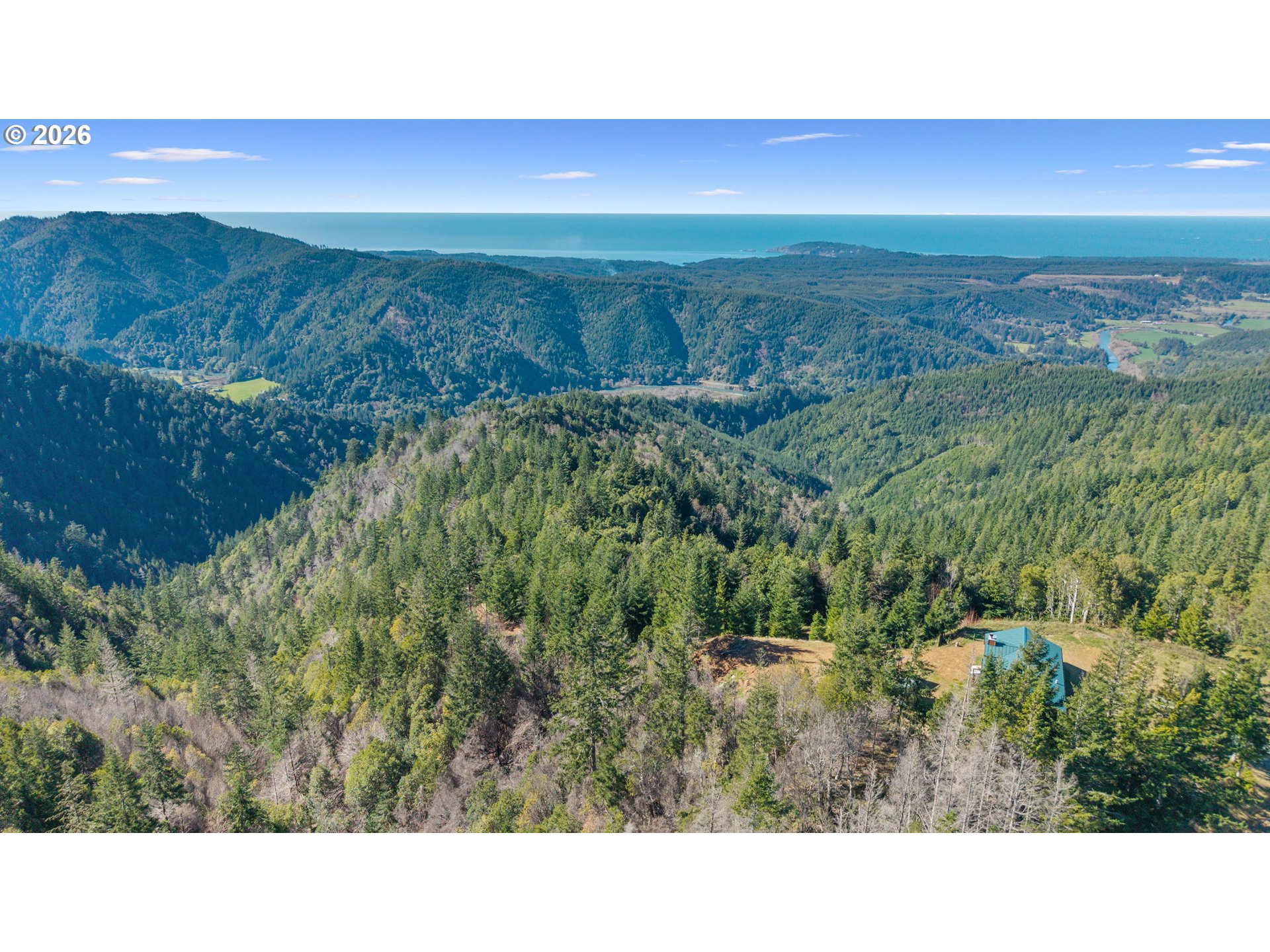 95300 Grassy Knob Road Port Orford, OR 97465 - Photo 20 of 25 a open area with mountains in the background