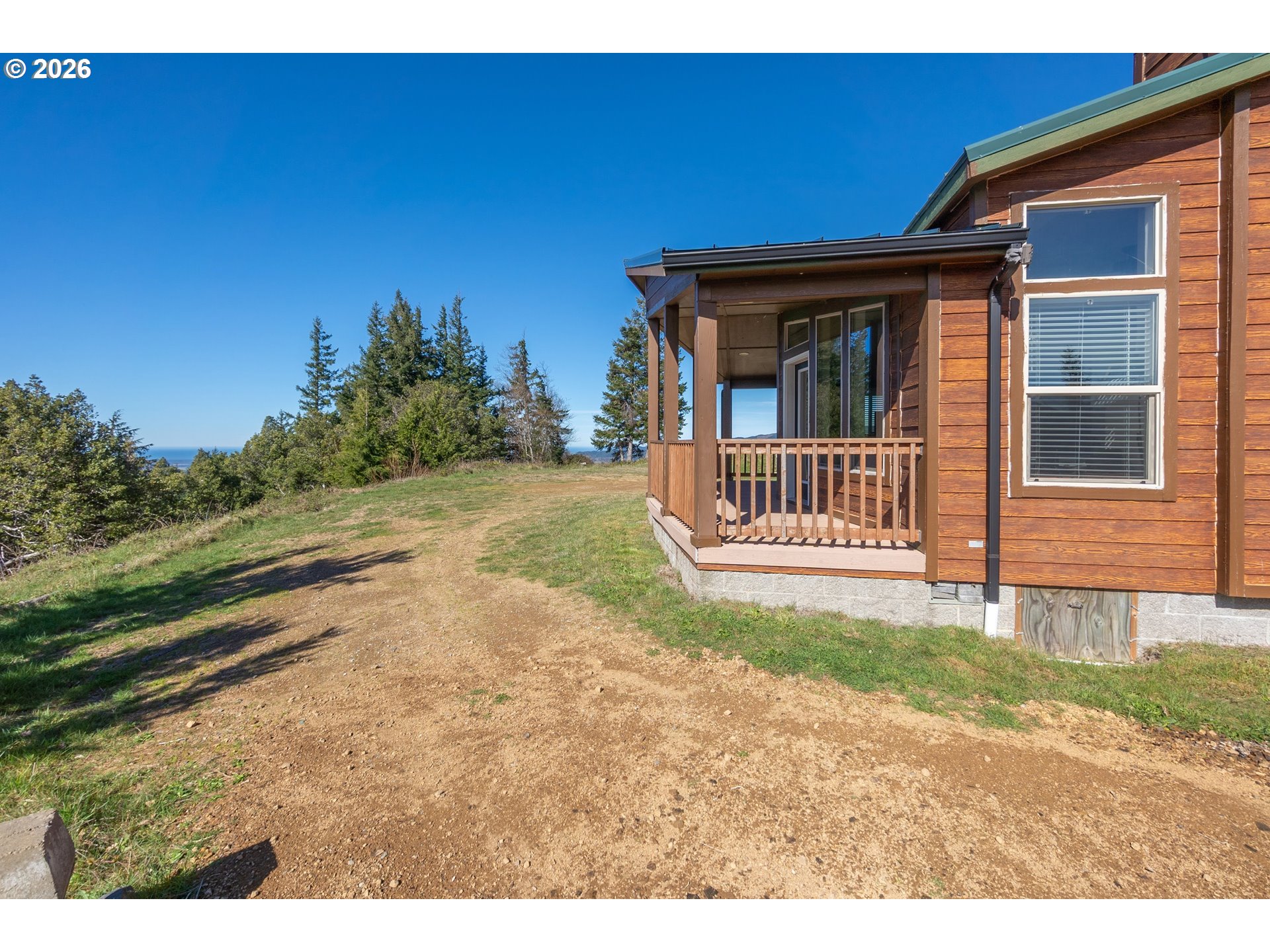 95300 Grassy Knob Road Port Orford, OR 97465 - Photo 3 of 25 a view of a house with a yard