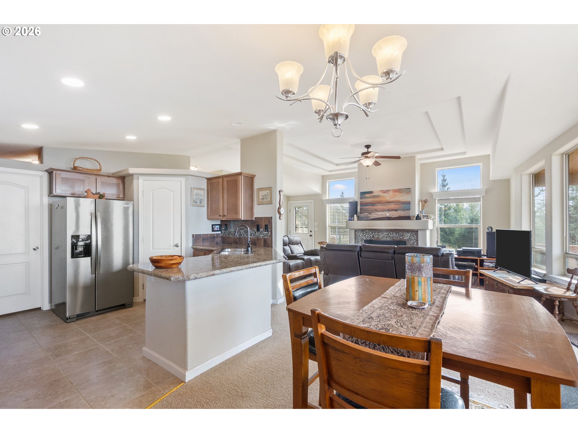 95300 Grassy Knob Road Port Orford, OR 97465 - Photo 7 of 25 a kitchen with a table chairs and refrigerator