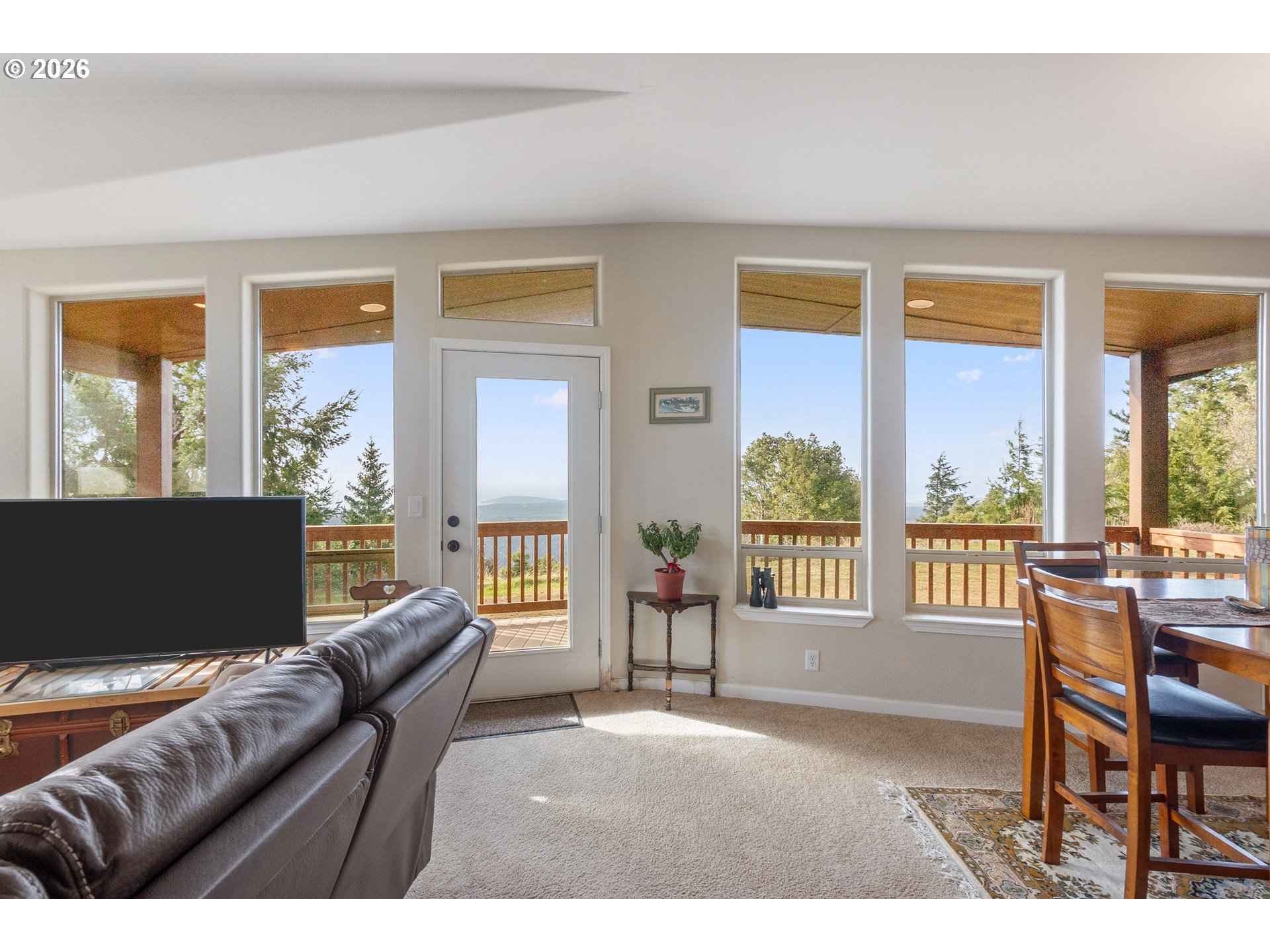 95300 Grassy Knob Road Port Orford, OR 97465 - Photo 8 of 25 a living room with furniture and a floor to ceiling window