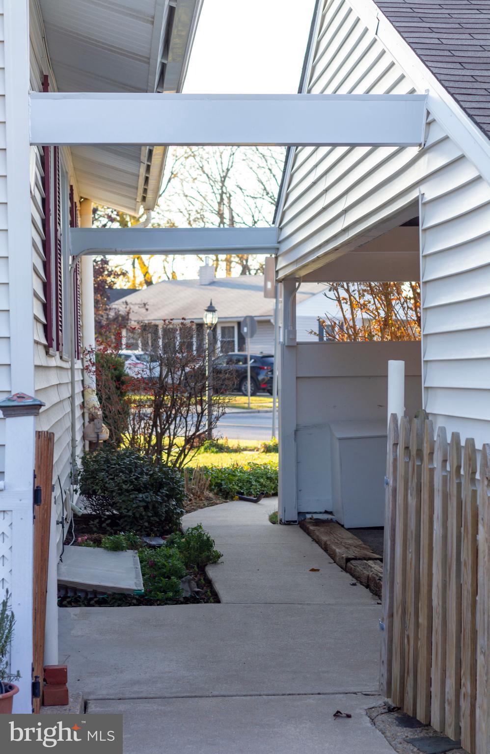 45 East Timonium Road Lutherville-Timonium, MD 21093 - Photo 46 of 47 Walkway between carport and side of house