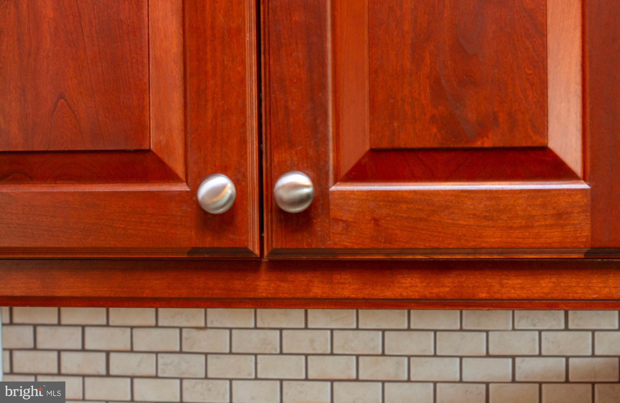 42" cherry cabinets w/tile back splash