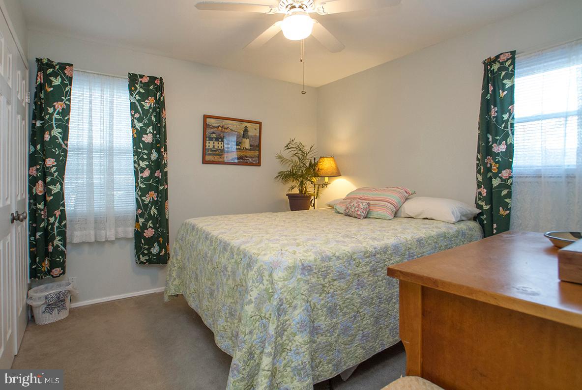 45 East Timonium Road Lutherville-Timonium, MD 21093 - Photo 9 of 47 Bedroom one w/ carpet over wood floor