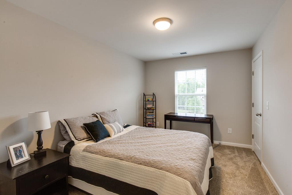 257 Abbey Road Lebanon, TN 37090 - Photo 15 of 18 a bedroom with a bed and window