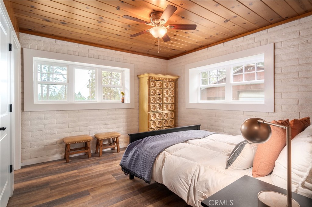 32190 Forward Mi Manton, CA 96059 - Photo 13 of 26 a bedroom with a bed and a chandelier