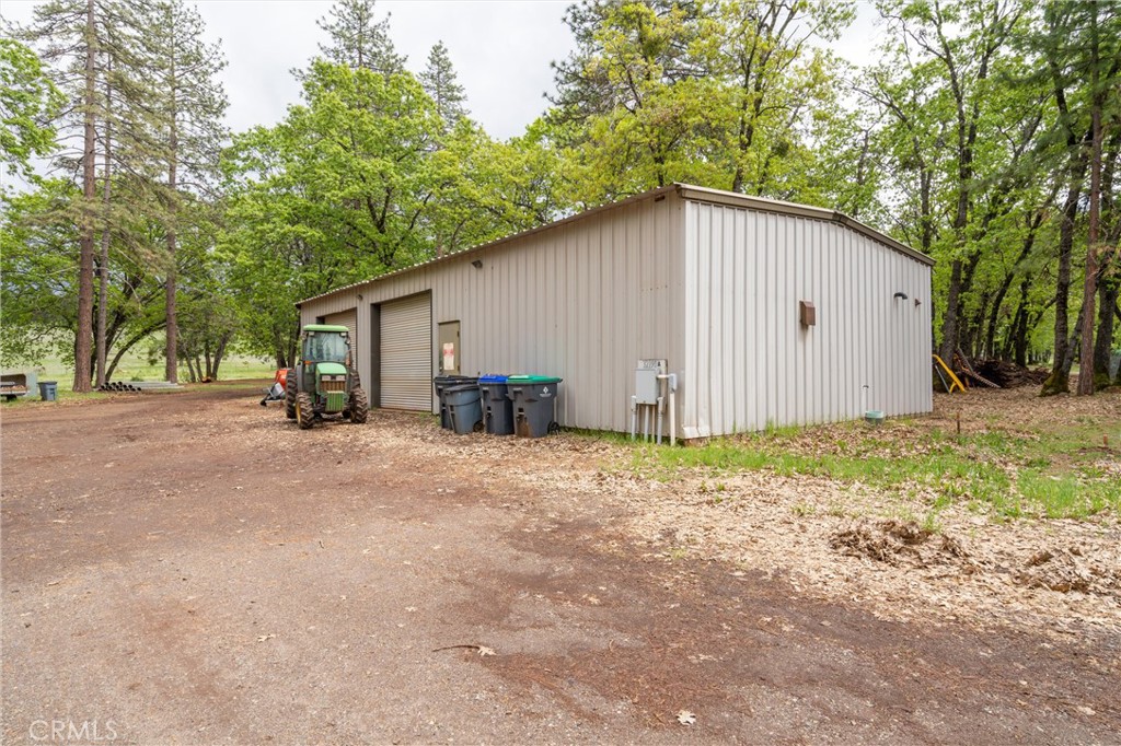 32190 Forward Mi Manton, CA 96059 - Photo 7 of 26 a view of a house with backyard and trees