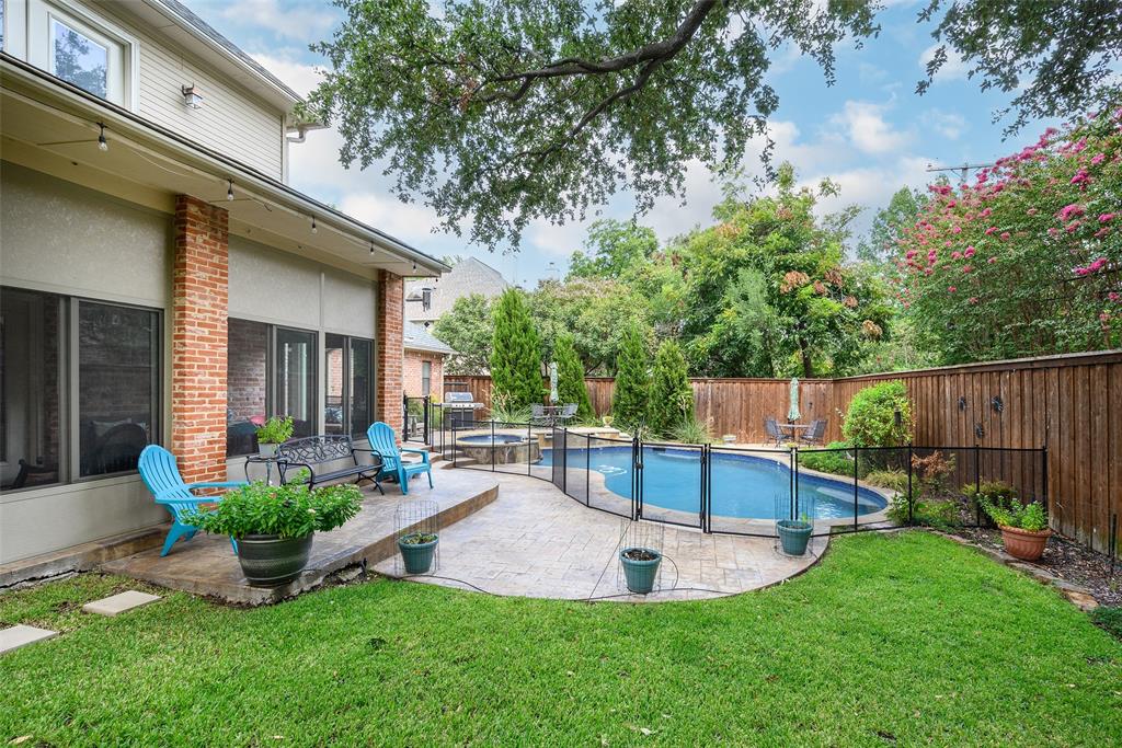 6822 Meadow Road Dallas, TX 75230 - Photo 30 of 35 Backyard lush and beautiful. 3 Season Porch view. Backyard lighting.