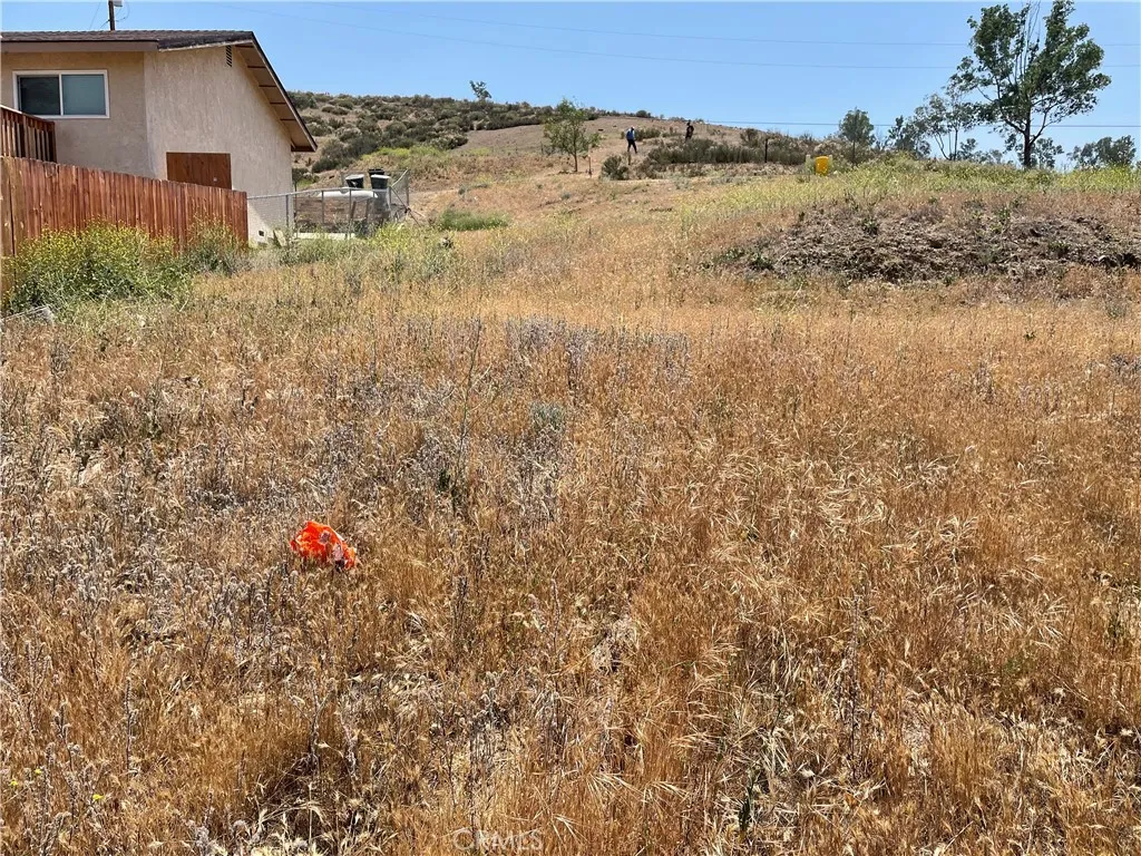 16 Riverside Drive Lake Elsinore, CA 92530 - Photo 18 of 34 a view of a lake with a mountain in the background