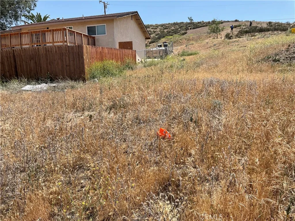 16 Riverside Drive Lake Elsinore, CA 92530 - Photo 21 of 34 a view of a house with a yard