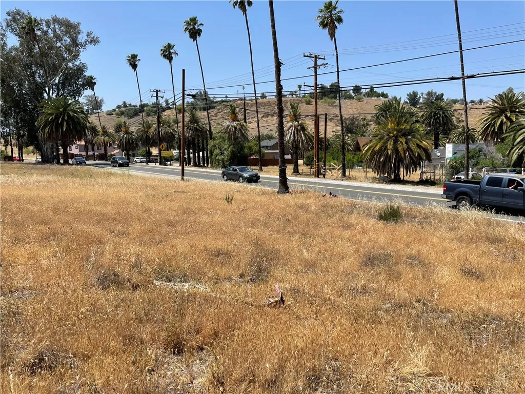 16 Riverside Drive Lake Elsinore, CA 92530 - Photo 6 of 34 a view of a street with a building in the background
