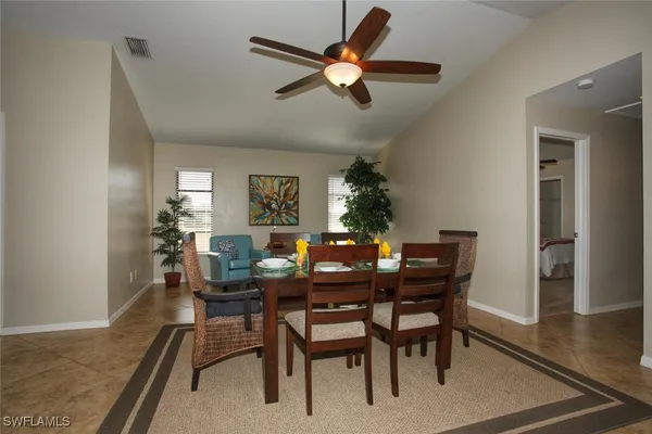 a view of a dining room with furniture