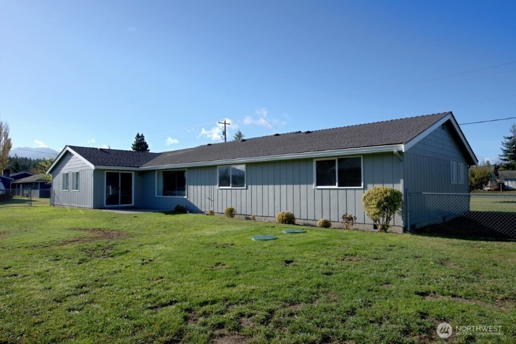 351 Vautier Road Sequim, WA 98382 - Photo 28 of 40 a view of a house with yard and deck
