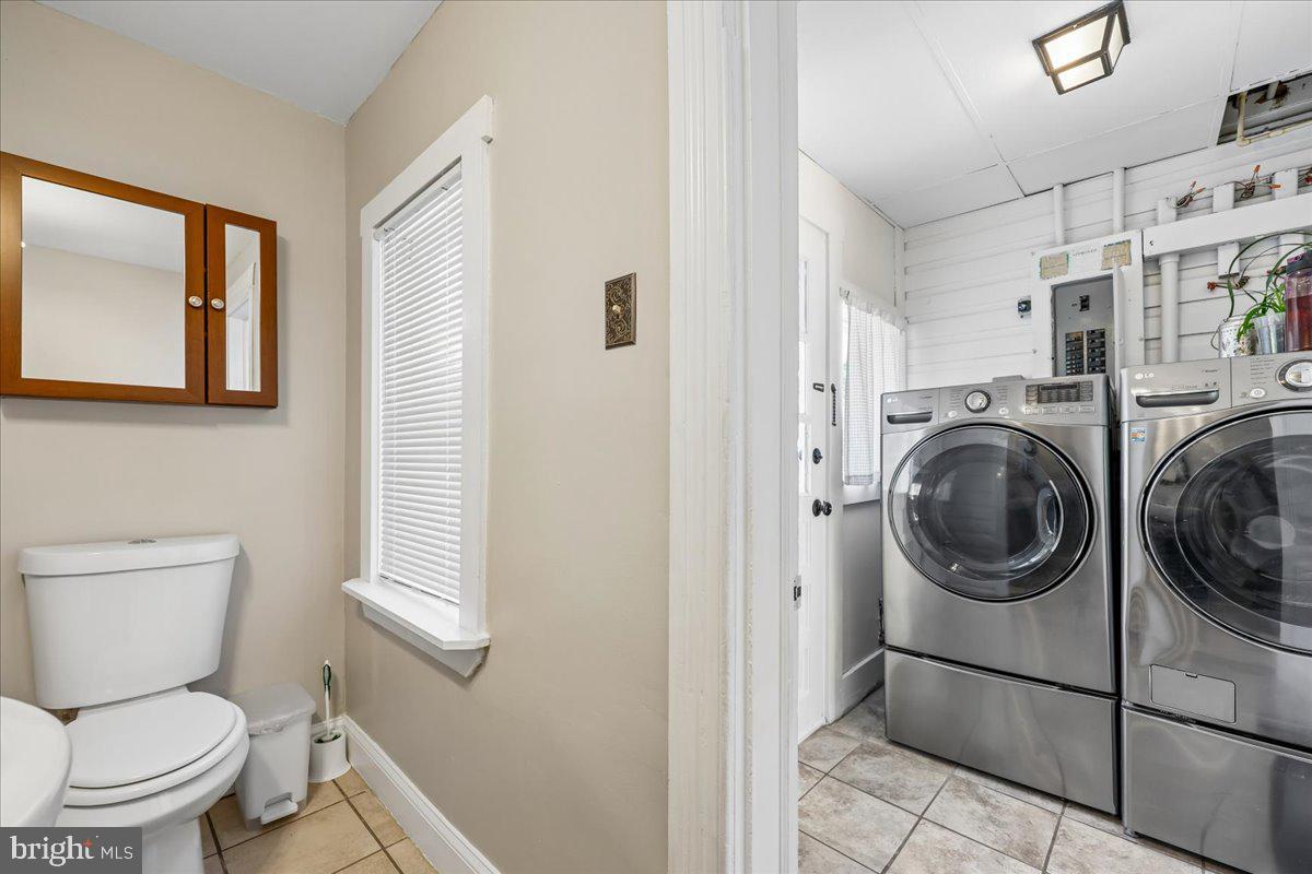 22165 Big Woods Road Dickerson, MD 20842 - Photo 10 of 28 Half Bathroom & Laundry