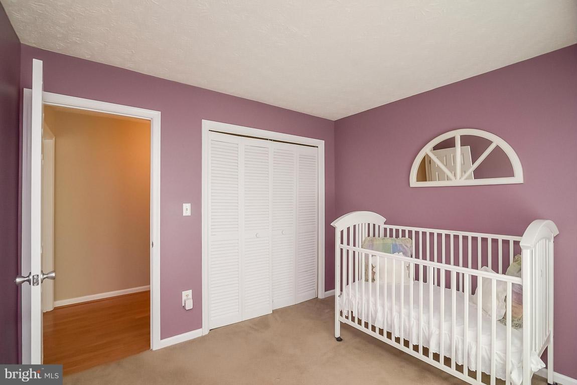 2253 Hunter's Run Drive, Unit 2253 Reston, VA 20191 - Photo 21 of 25 a view of livingroom with a hallway