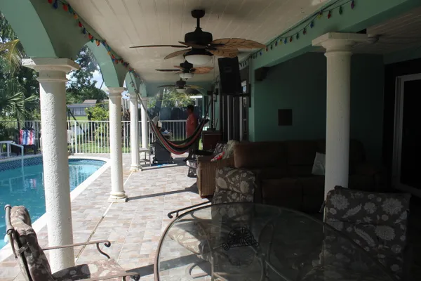a view of outdoor dining space with a patio