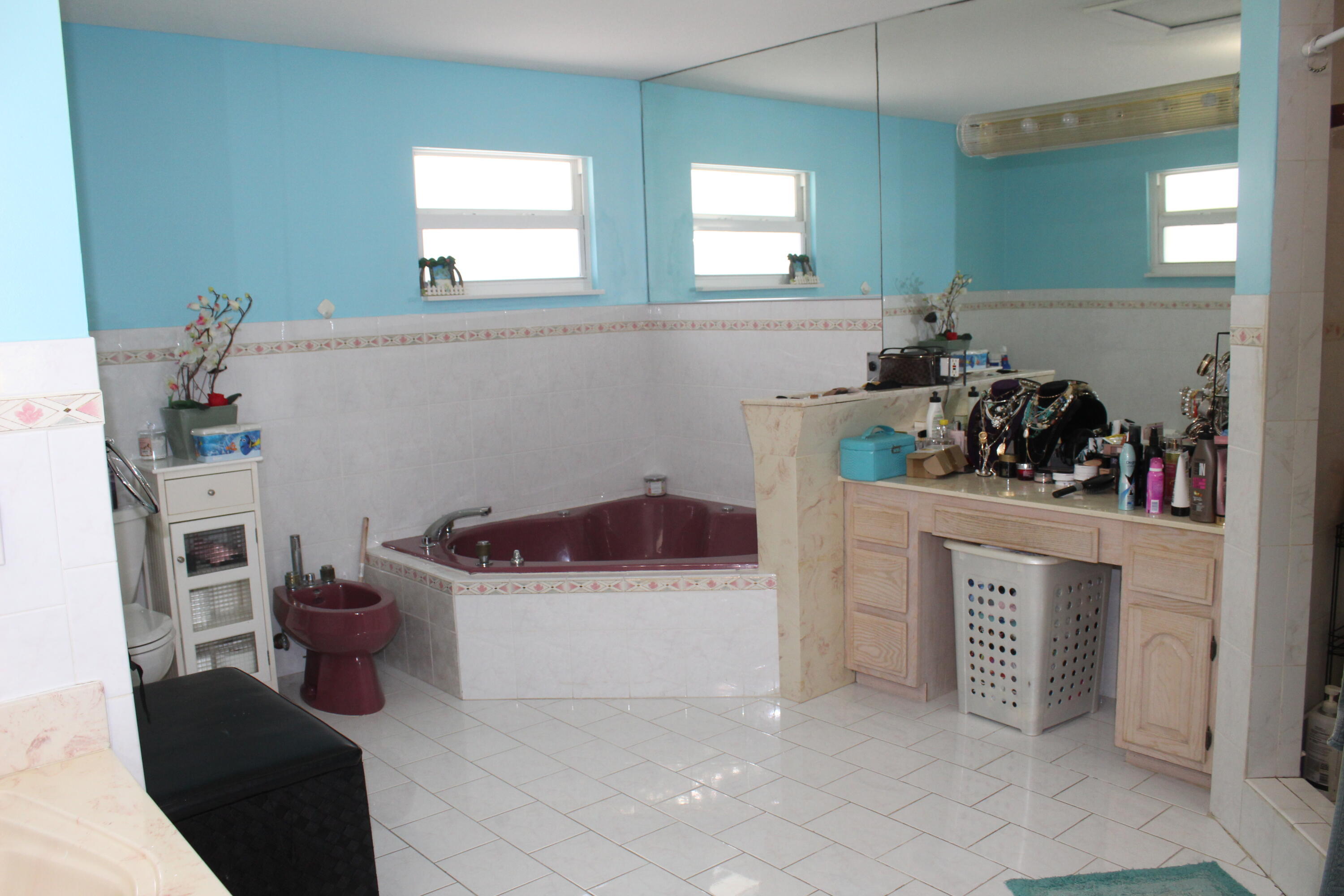 13847 Geranium Place Wellington, FL 33414 - Photo 36 of 50 a kitchen with a cabinets and window