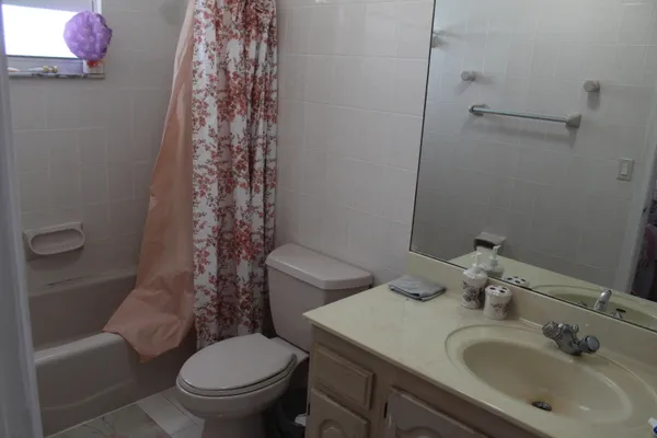 a view of balcony and yard