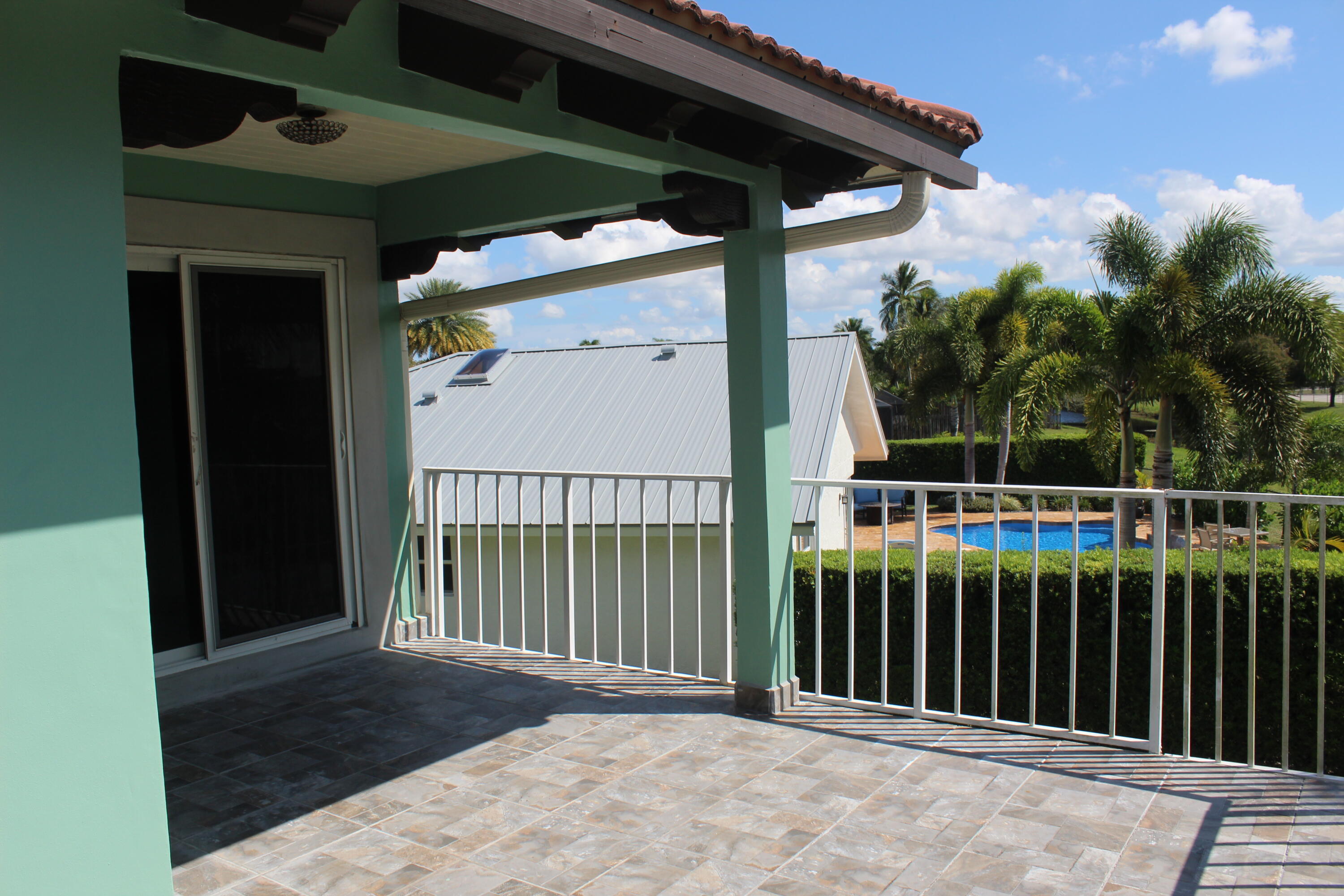 13847 Geranium Place Wellington, FL 33414 - Photo 44 of 50 a view of a balcony