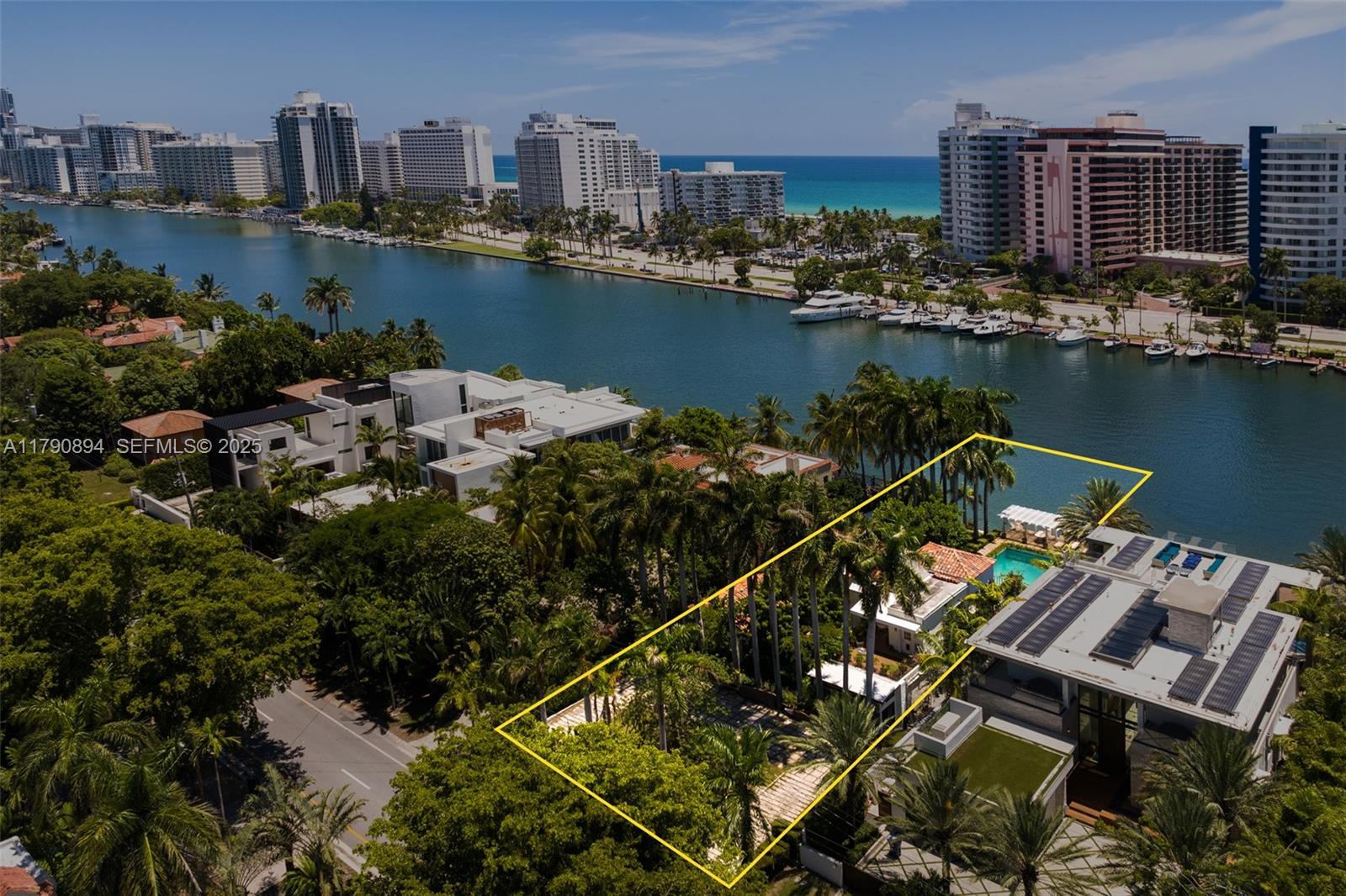 5215 Pine Tree Drive Miami Beach, FL 33140 - Photo 25 of 28 a view of a city and an ocean view