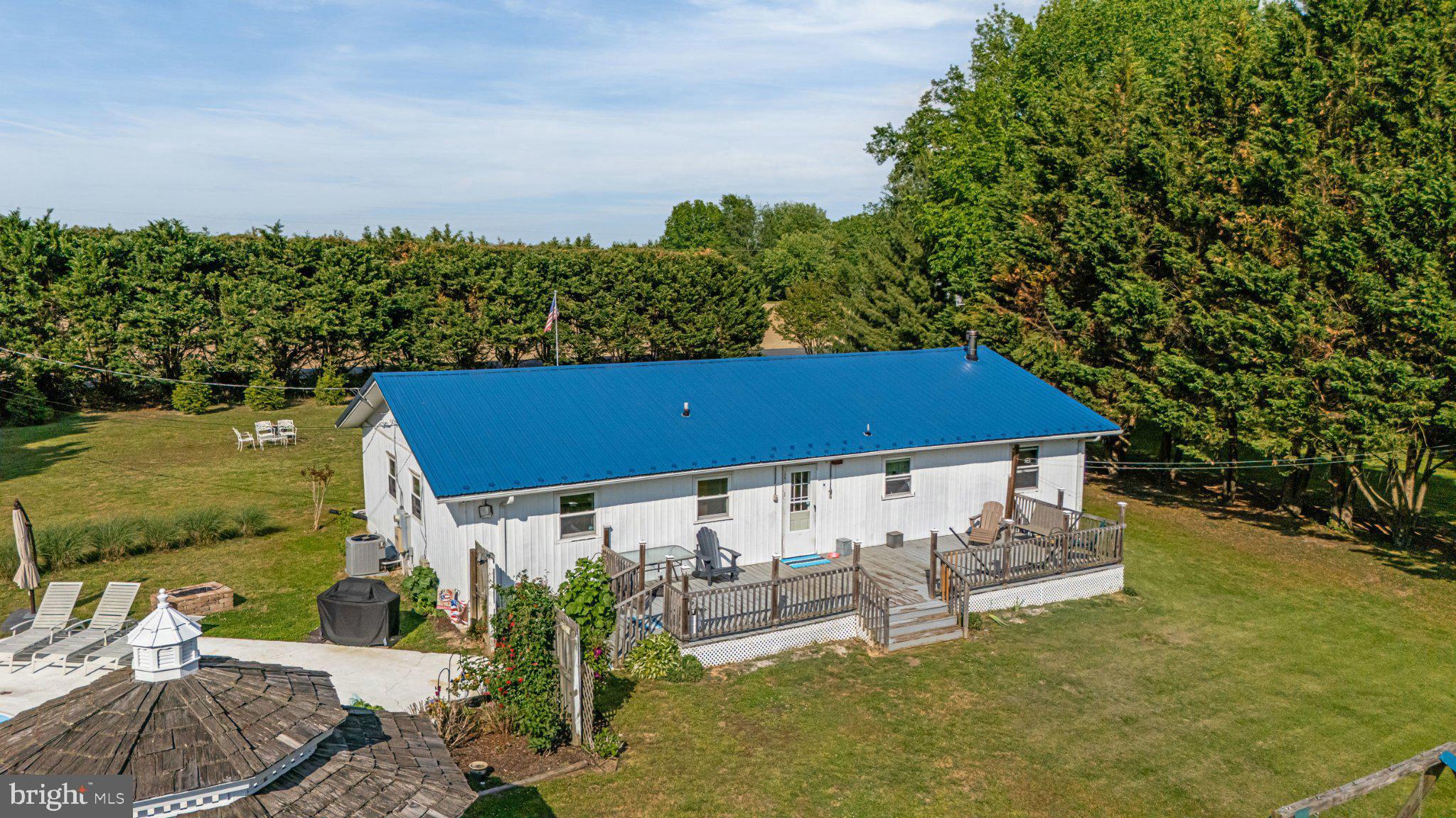 310 Dogtown Road Townsend, DE 19734 - Photo 27 of 43 Charming home with vibrant blue roof.