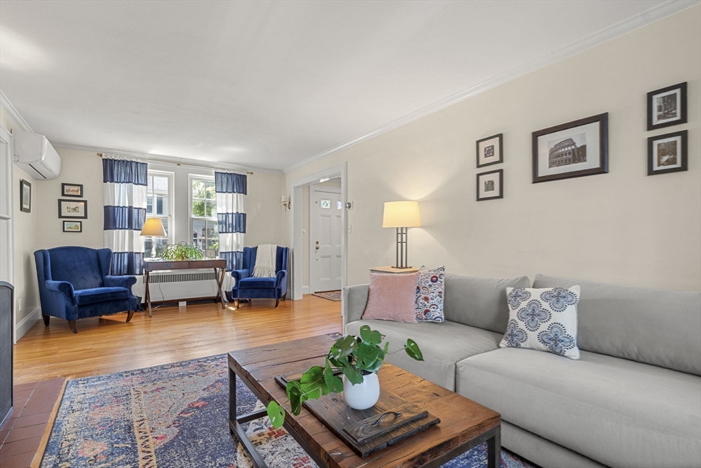56 Allen Circle Milton, MA 02186 - Photo 17 of 34 a living room with furniture and a window