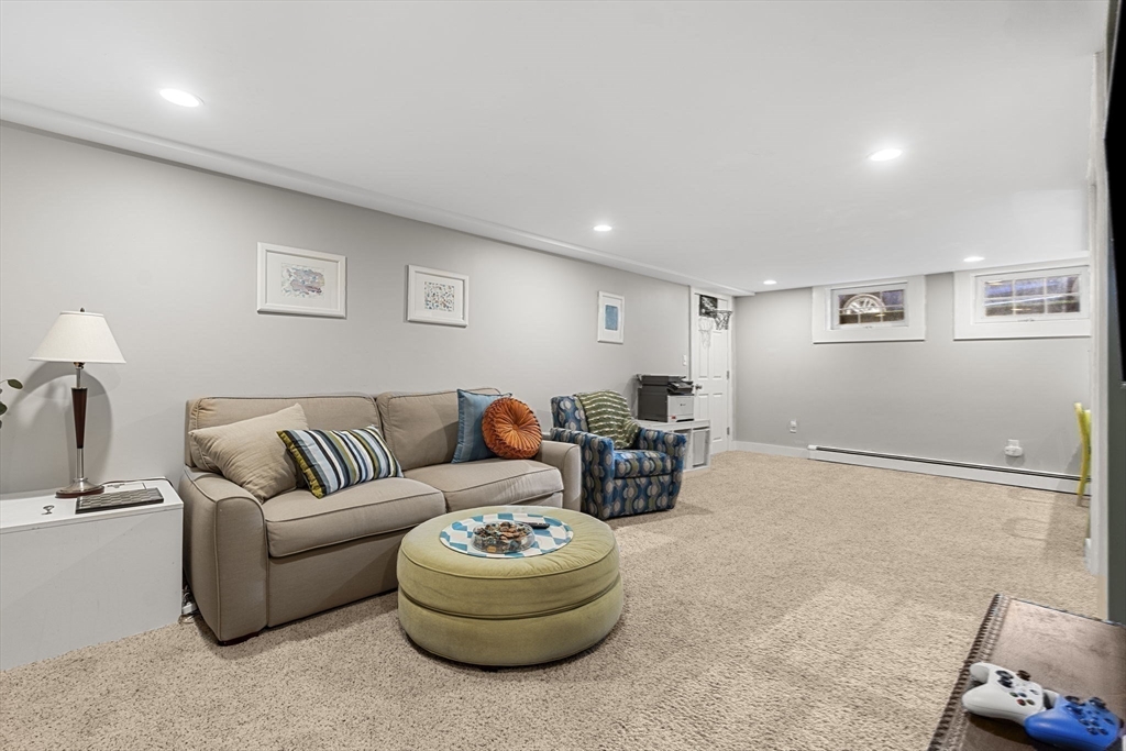 56 Allen Circle Milton, MA 02186 - Photo 27 of 34 a living room with furniture and a couch