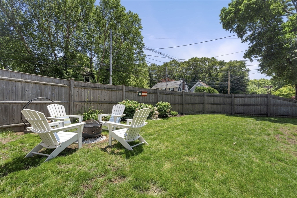 56 Allen Circle Milton, MA 02186 - Photo 30 of 34 a garden view with a seating space