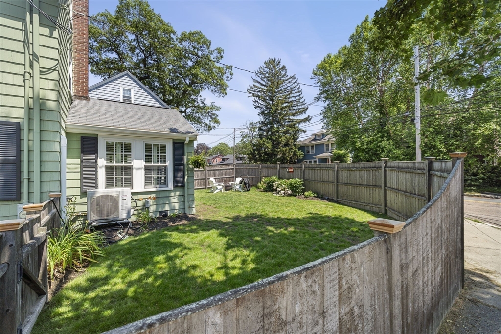 56 Allen Circle Milton, MA 02186 - Photo 31 of 34 a view of a house with backyard and sitting area