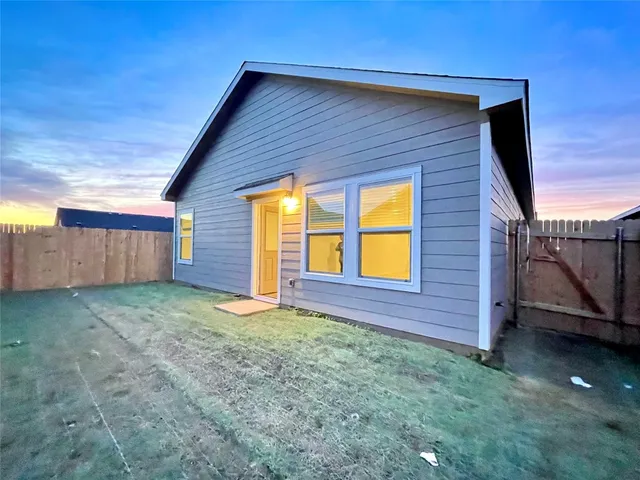 a view of backyard of house