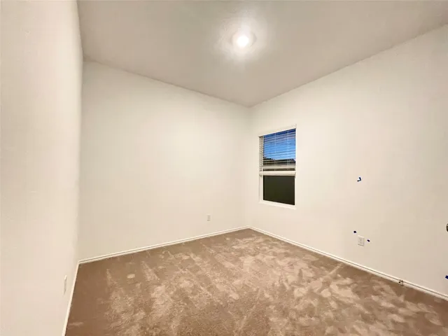 a bathroom with a sink a toilet and a shower