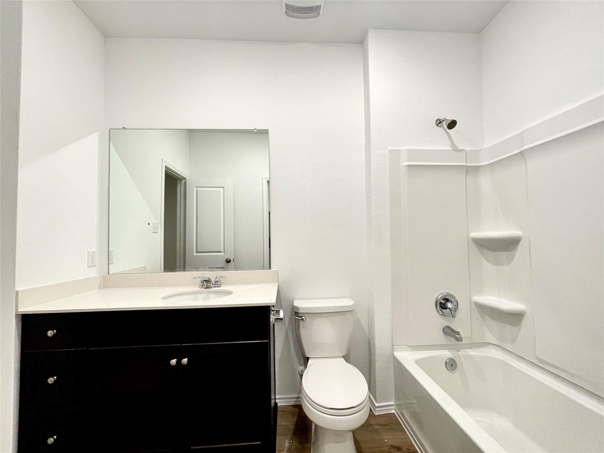332 Amber Glen Maxwell, TX 78656 - Photo 23 of 24 a bathroom with a bathtub shower sink mirror vanity and toilet