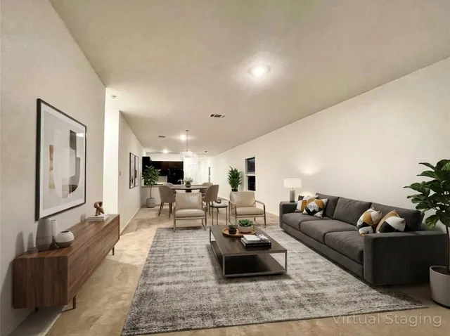 a living room with furniture and a couch