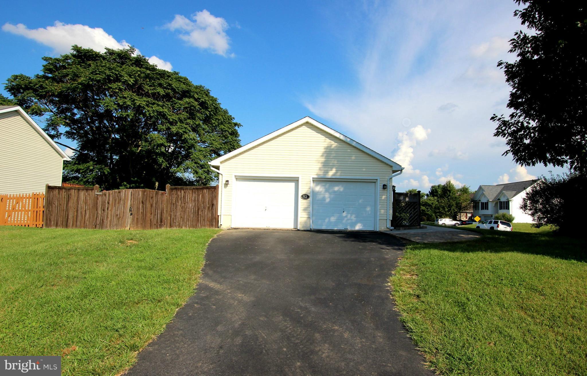 12 Cottontail Court Ranson, WV 25438 - Photo 4 of 29 a view of a house with a yard and tree s