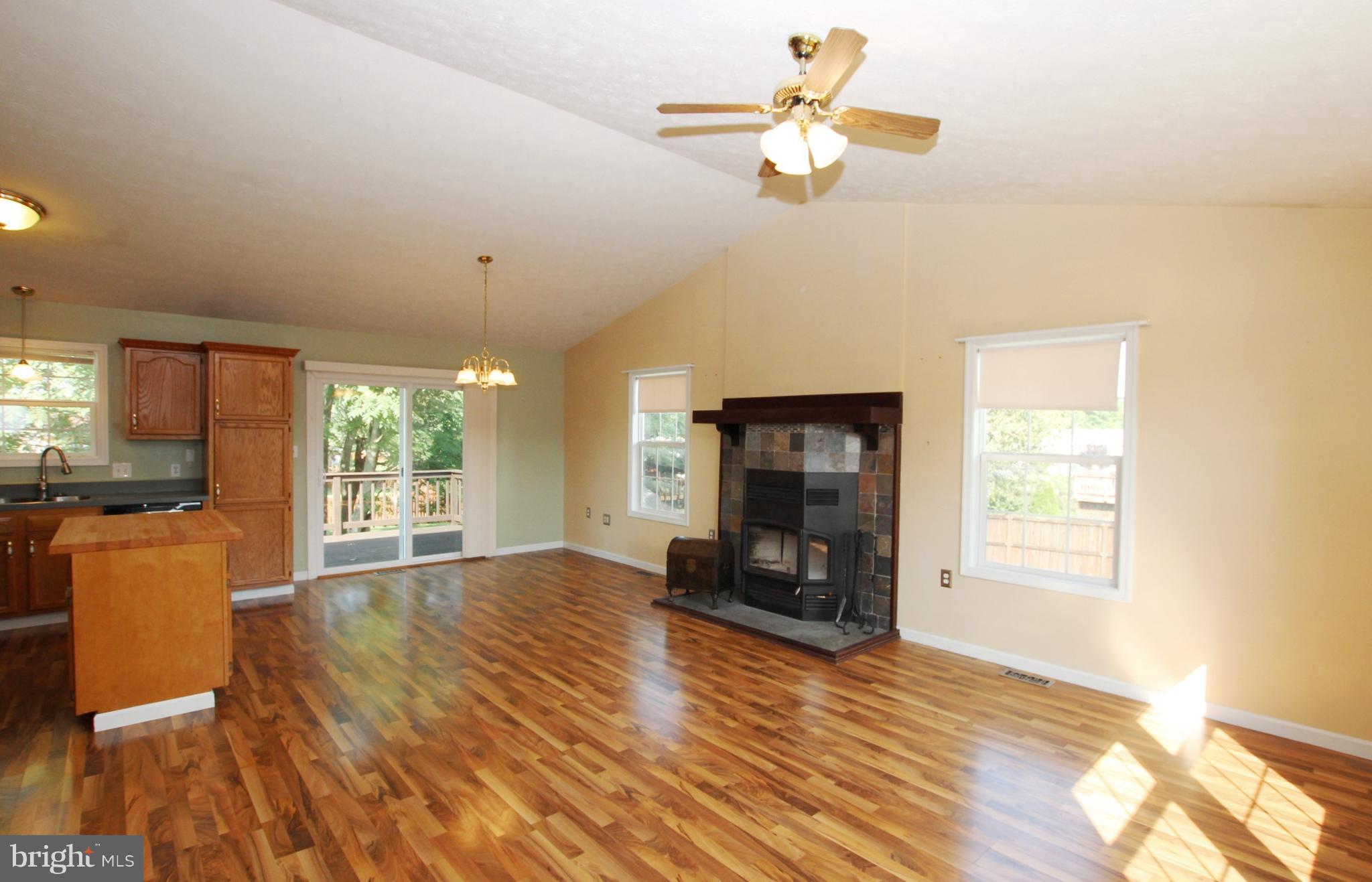 12 Cottontail Court Ranson, WV 25438 - Photo 10 of 29 a view of empty room with wooden floor and fan