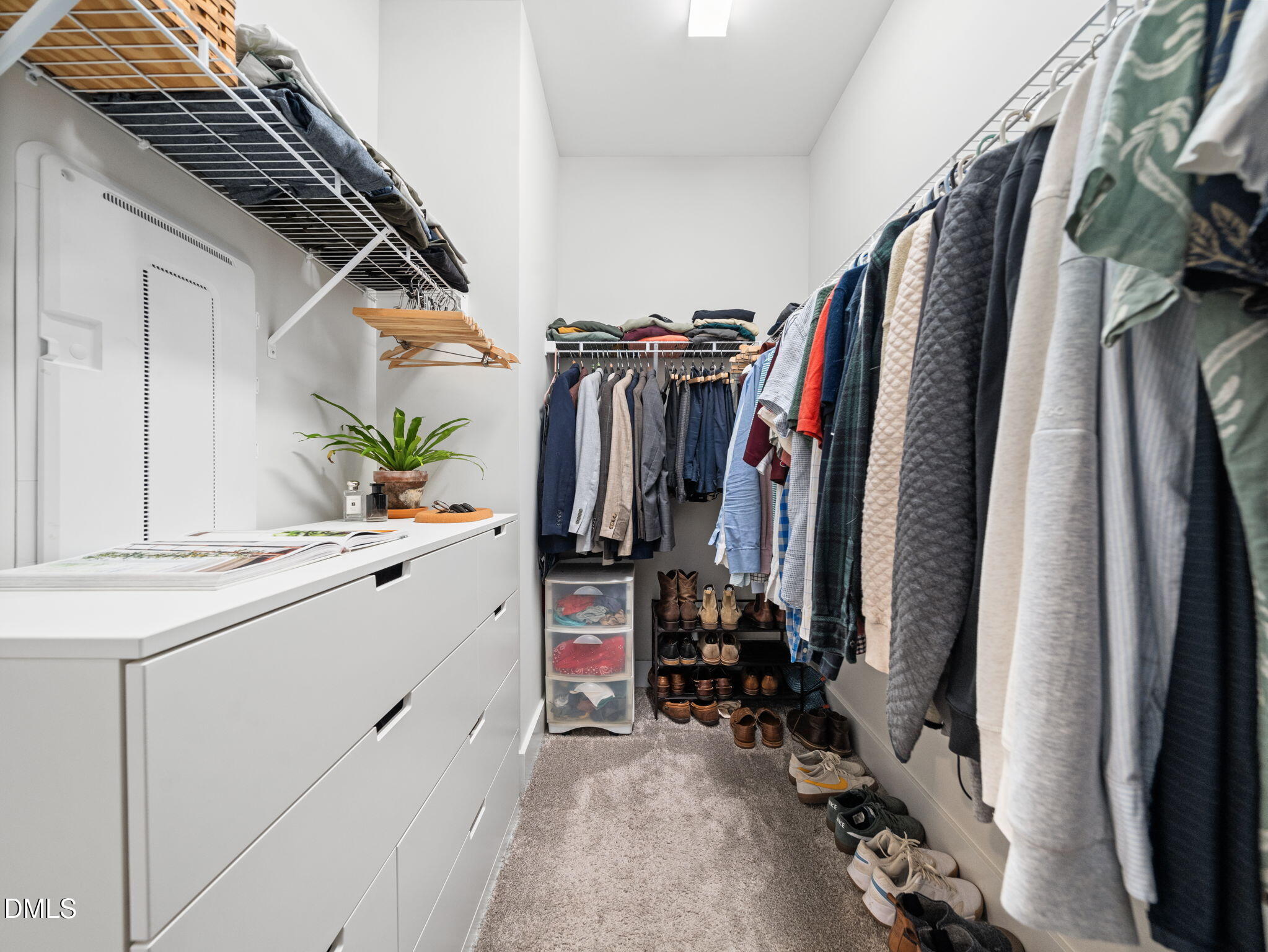 916 Waterside View Drive Raleigh, NC 27606 - Photo 17 of 22 a view of walk in closet with clothes and shoes