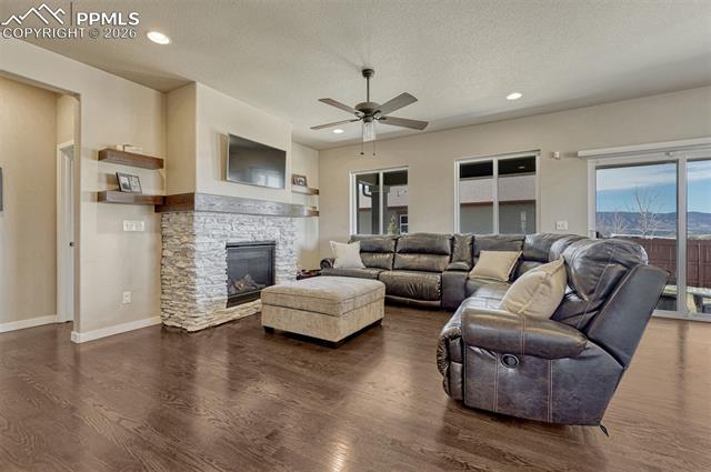 3203 Red Cavern Road Colorado Springs, CO 80908 - Photo 31 of 46 Open-concept living with newly finished hardwood floors