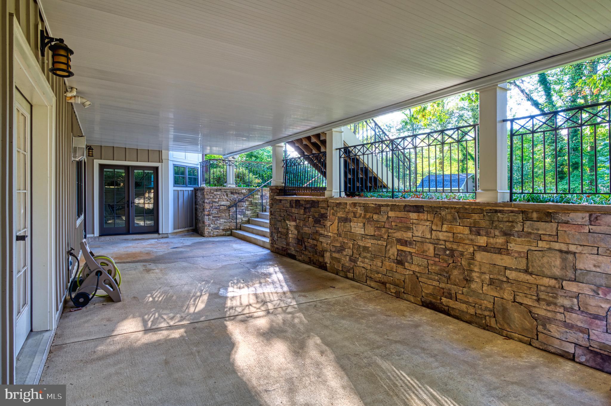 504 Druid Hill Road Northeast Vienna, VA 22180 - Photo 78 of 98 Covered terrace off lower level