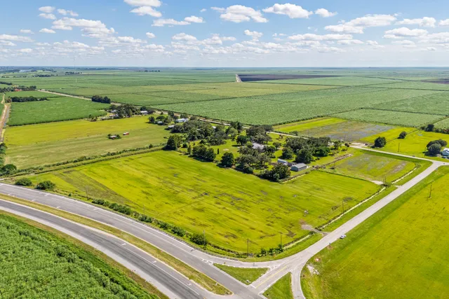 a view of a pool in a field