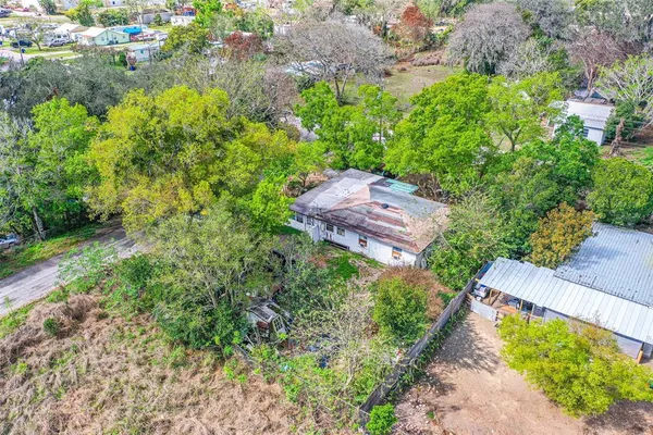 an outdoor space with furniture and garden