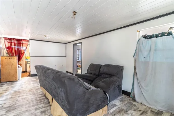 a living room with furniture and a couch