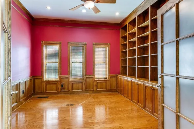 a view of walk in closet and window
